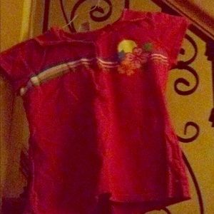 A pink Canyon River Blues t-shirt